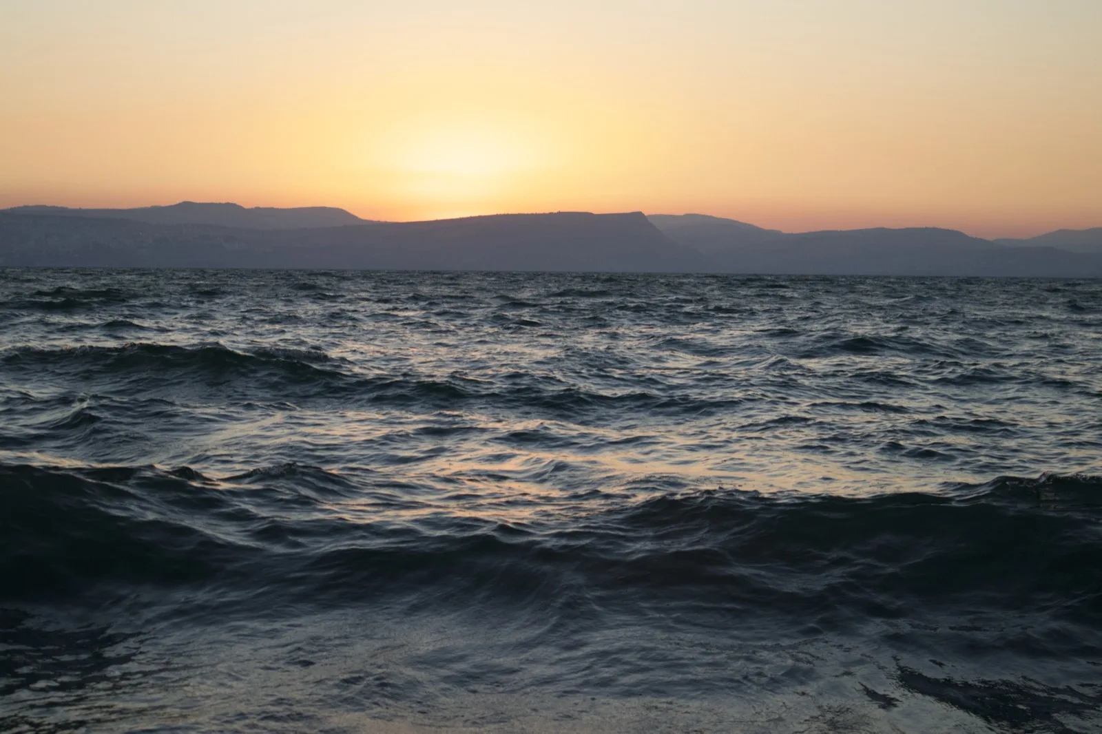 Kinneret at sunset, looking toward Mount Arbel